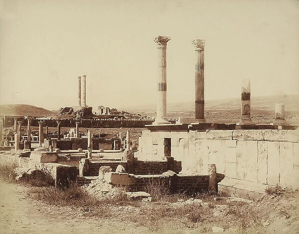 View of Timgad (Thamugadi) in the Algerian hinterlands, with the so-called Market of Sertius and tall columns of the Campidoglio in the background