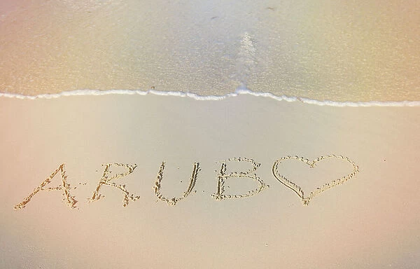 Aruba, Aruba written on sand at Juanita Beach