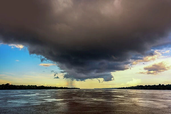 Brazil, dense cloud over Amazon river