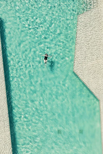 Colombia, Bird's eye view of Woman swimming
