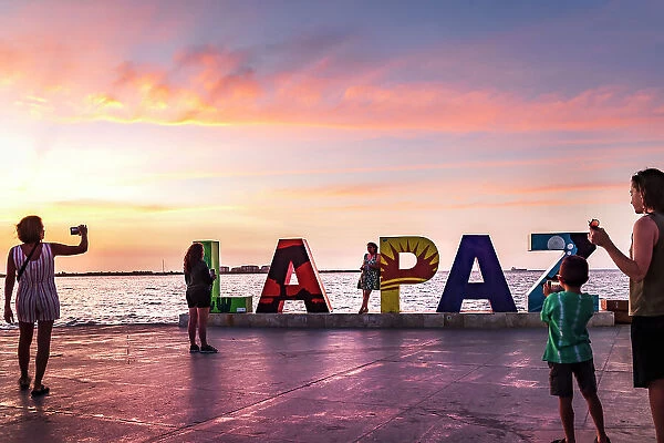Mexico, La Paz, Malecon, La Paz sign, sunset, waterfront boardwalk