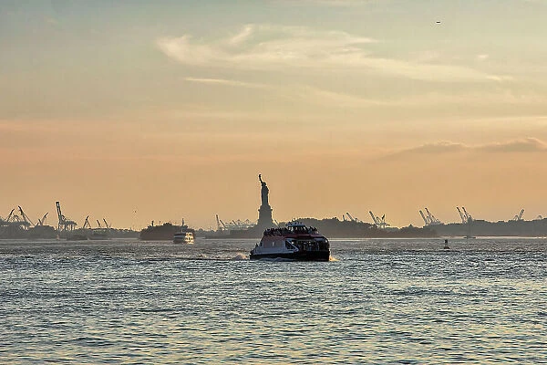 New York City, Brooklyn, View of Statue of Liberty from Brooklyn Bridge Park