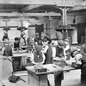 Children labelling tins of tea c. 1910, Butlers Wharf BB87_09690
