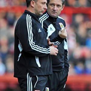 Bristol City Managers Derek McInnes and Tony Docherty Discussing Tactics Ahead of Championship Match