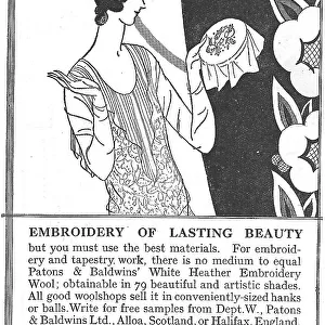 Advert for Patons and Baldwin's tapestry wools, with a lady admiring her work Date: 1920s