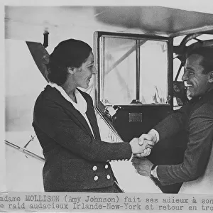 Amy Johnson Shaking Hands with her Husband Jim Mollison ?