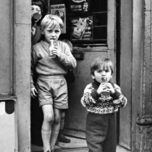 Boys coming out of a sweet shop, Balham, SW London