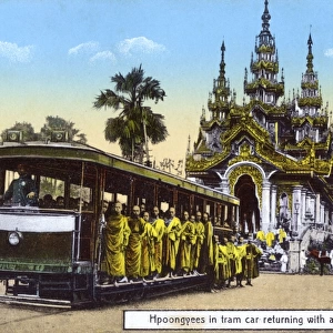 Buddhist Monks take the tram home from the Shwedagon Pagoda