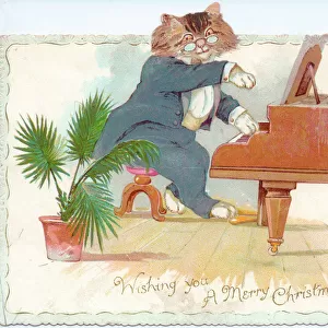 Cat playing the piano on a Christmas card