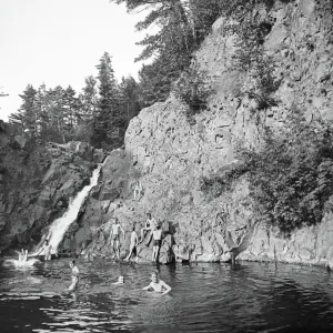 Children swimming at a swimming hole at Lester Park in Dulut