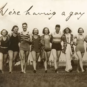 Twelve Chums having a gay old time on the beach