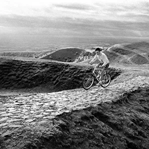 Cyclist on the Malvern Hills above Droitwich, Worcs
