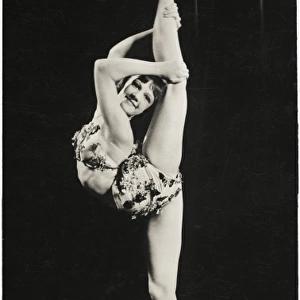 Dancer & Contortionist performing vertical splits