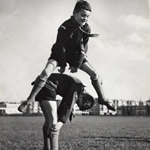 Dutch boy scouts playing leapfrog, Holland