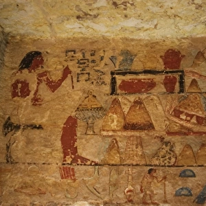Egyptian Art. Deceased seated next to the offerings table. R
