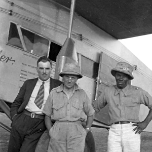 Engineer P. A. F. Hunt, centre, in front of Fokker FVII, G?