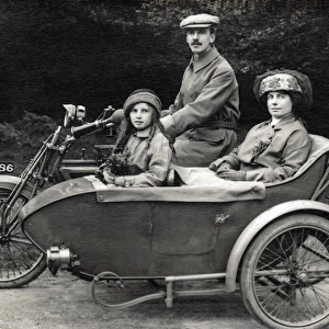 Family of three on a 1907 / 8 Matchless motorcycle & sidecar