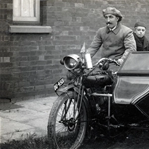 Family of three on a 1915 Indian motorcycle