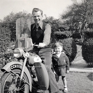 father and sonwith a 1951 / 2 BSA Bantam motorcycle