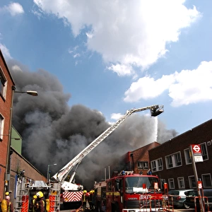 Firefighters in action at a fire, VDC House, Wembley
