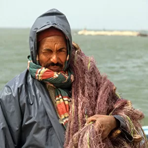 A fisherman wearing oilskins. Djerba, Tunisia