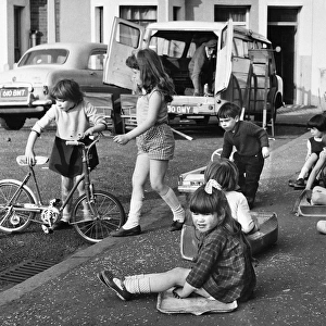 Group of children playing on a Balham street, SW London