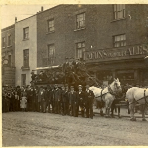 Group with dray horses outside Lacons Yarmouth Ales
