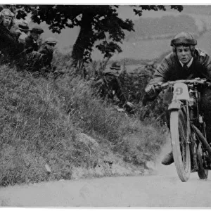 H. O. Tomblin on his racing motorcycle