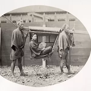 Japanese woman in a kago, carrying chair, Japan, c. 1870 s