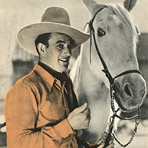 John Wayne, American film star, with horse