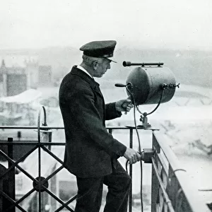 Lookout man operating signalling lamp, Croydon Airport