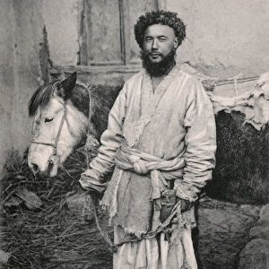 A man from the Dasht-e Yahudi with his Mule