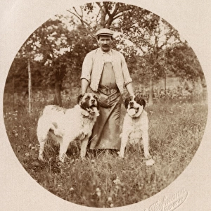 Man with two dogs in a field, Switzerland