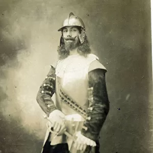 A man dressed in authentic English Civil War costume. Date: c. 1910
