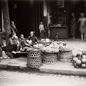 Market scene, stallholders selling food, Vietnam