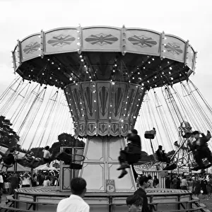 Riding carousel at fairground