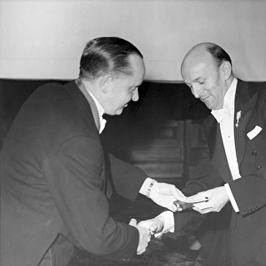 Sir George Edwards is presented with the British Gold Medal