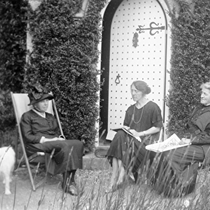 Three sisters sitting in a Pembrokeshire garden