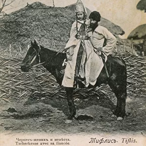 Tbilisi, Georgia - Husband on horseback with young fiancee