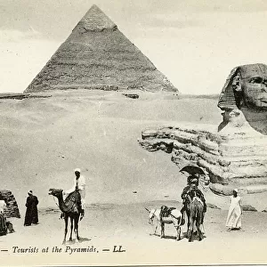 Tourists at the Pyramids and the Sphinx, Cairo, Egypt