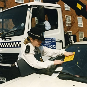 Woman police officer in a London street