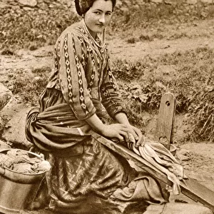 Woman washing clothes, Savoie district, France