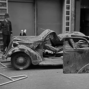 A wrecked car in Howland Street, London