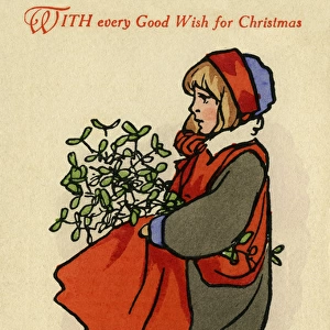 Young boy with mistletoe