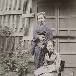Two young Japanese women with plants