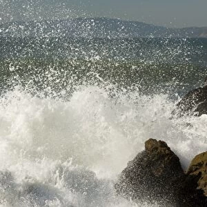 Waves breaking on the rocky Pacific Ocean coast of San Francisco, central/north California, USA