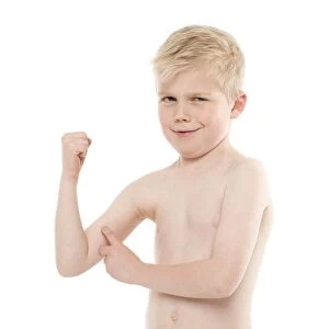 Boy flexing his biceps