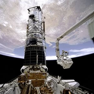 HST during the last servicing EVA, STS-61