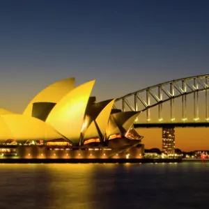 Australia, New South Wales, Sydney. Sydney Harbour bridge and the opera house viewed at dusk