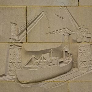 England, Tyne and Wear, Newcastle Upon Tyne. Carving on the reconstructed city wall near the quayside heralding the ship building heydays of Newcastle
